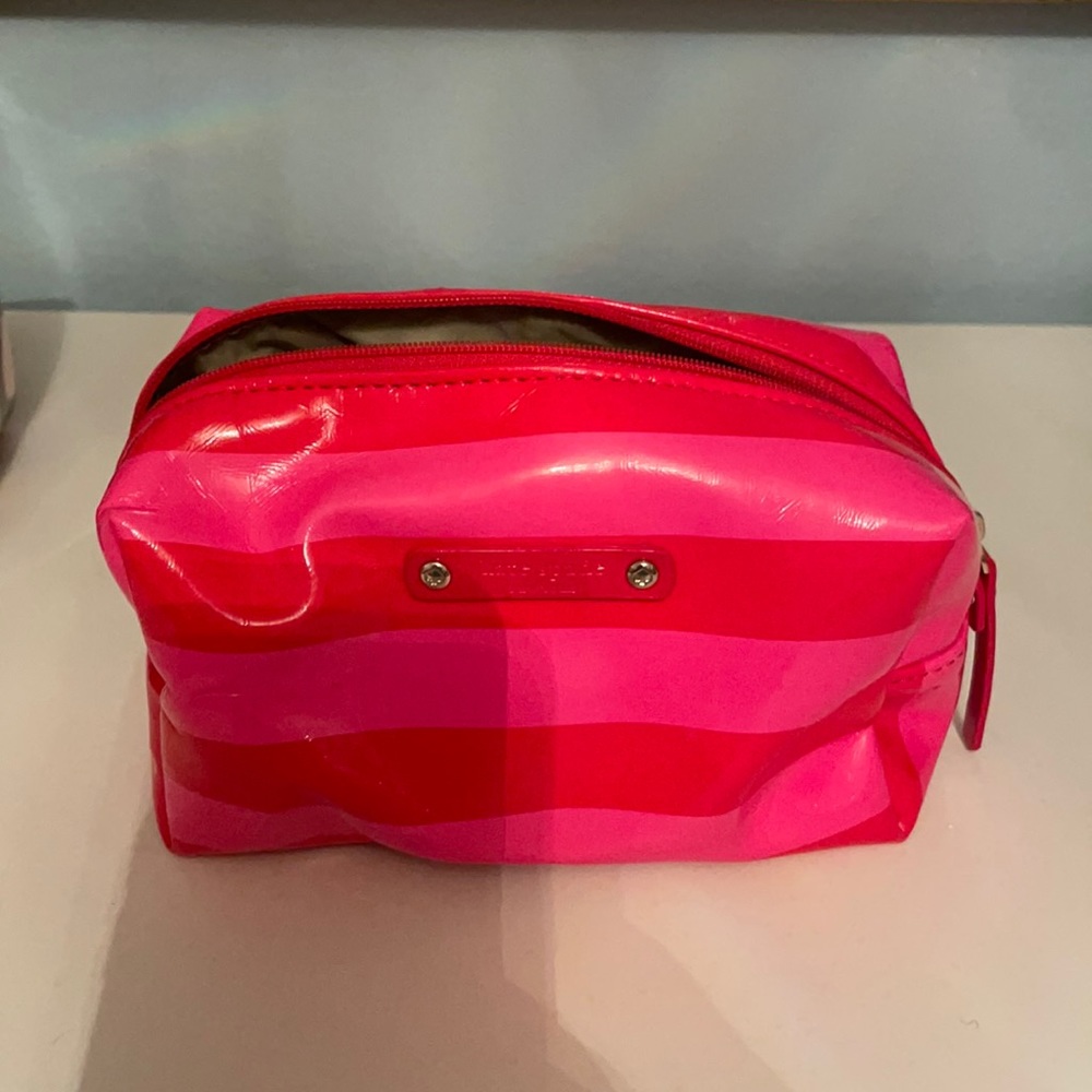 Pink and red Kate Spade makeup case